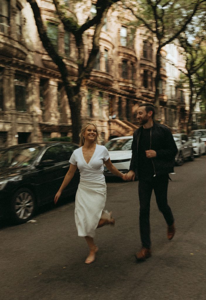 NYC City Elopement l Couple running through the Brownstones in Upper Manhattan 